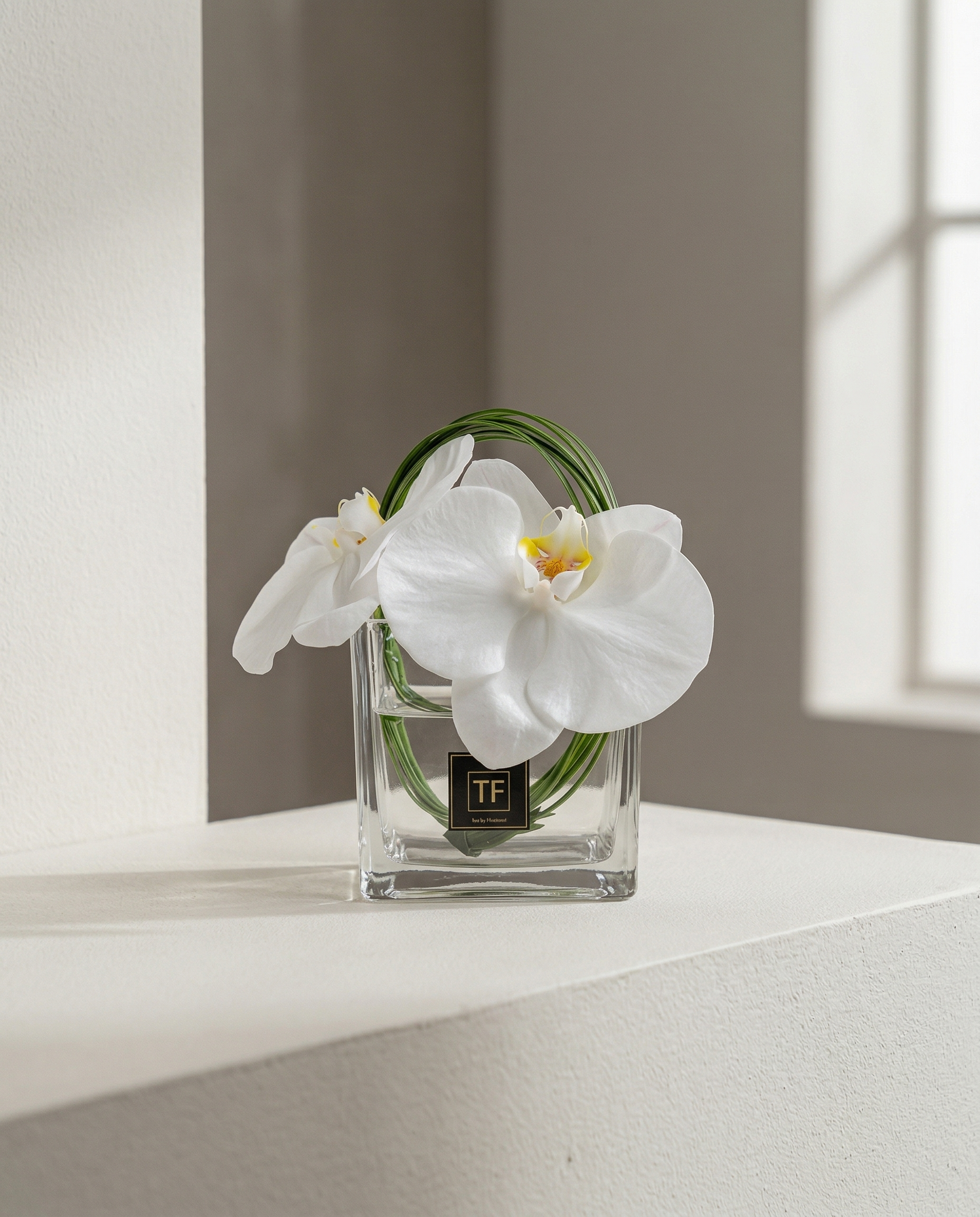 Orchid & Steel Grass Arrangement